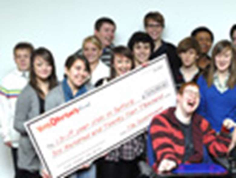 Young people with cheque